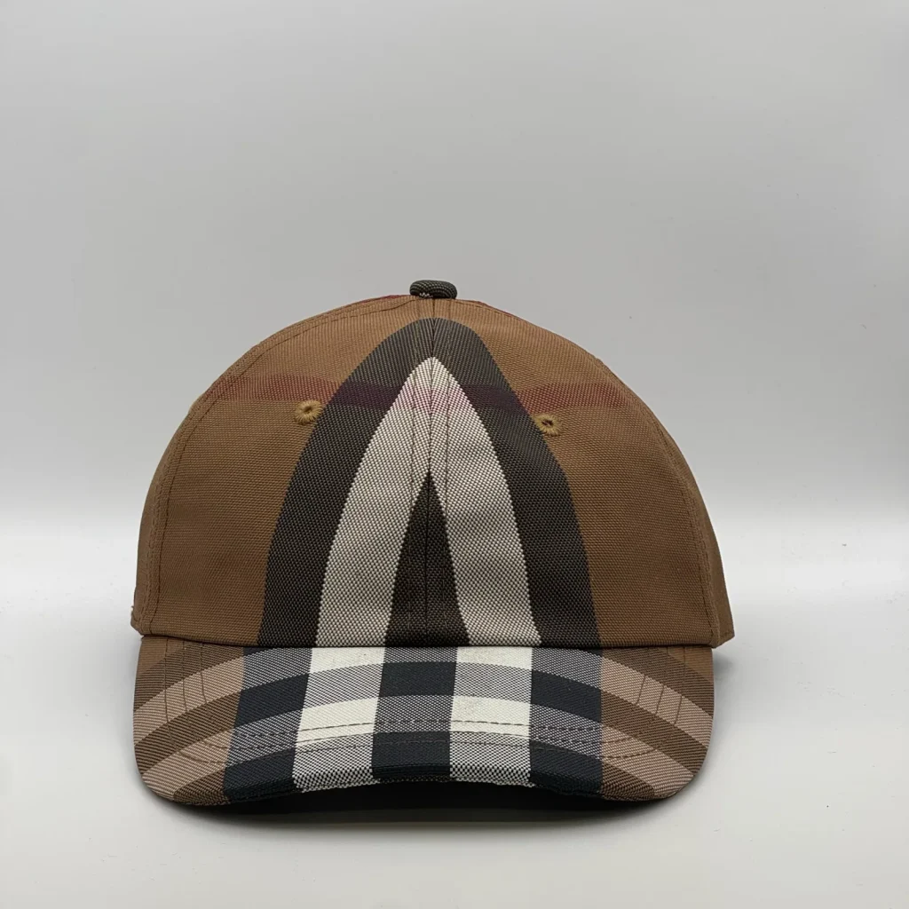 Brown check Burberry cap, three-quarter front-left view.