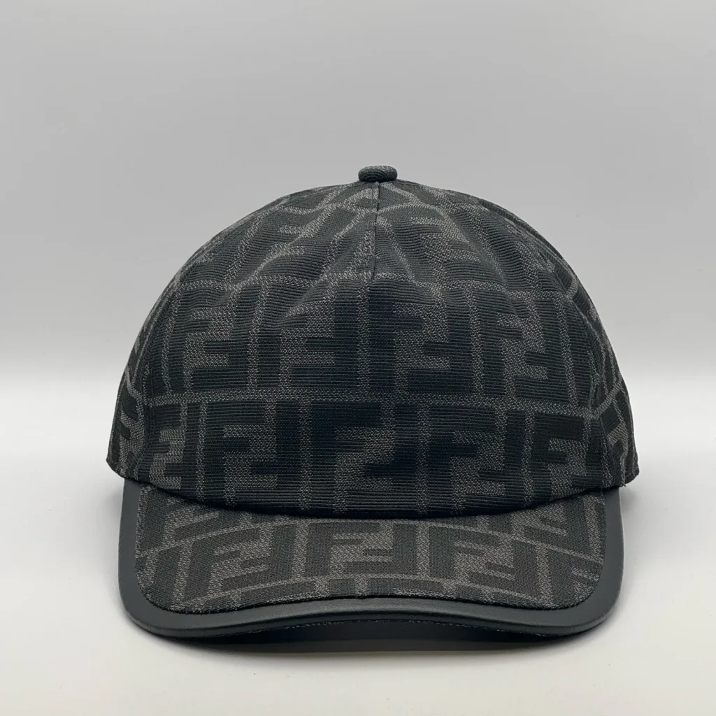 Black-on-black Fendi FF cap, three-quarter front view.