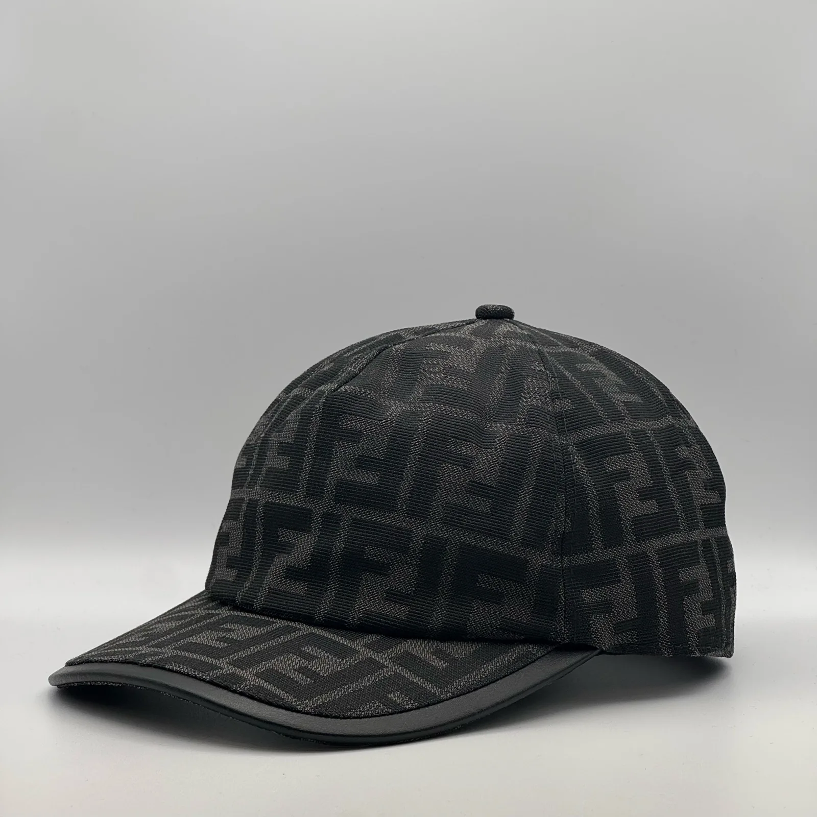 Black-on-black Fendi FF cap, opposite side profile.