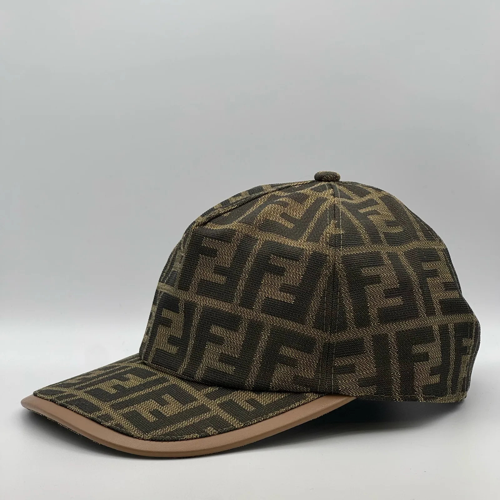 Brown Fendi FF cap, three-quarter front-right view.