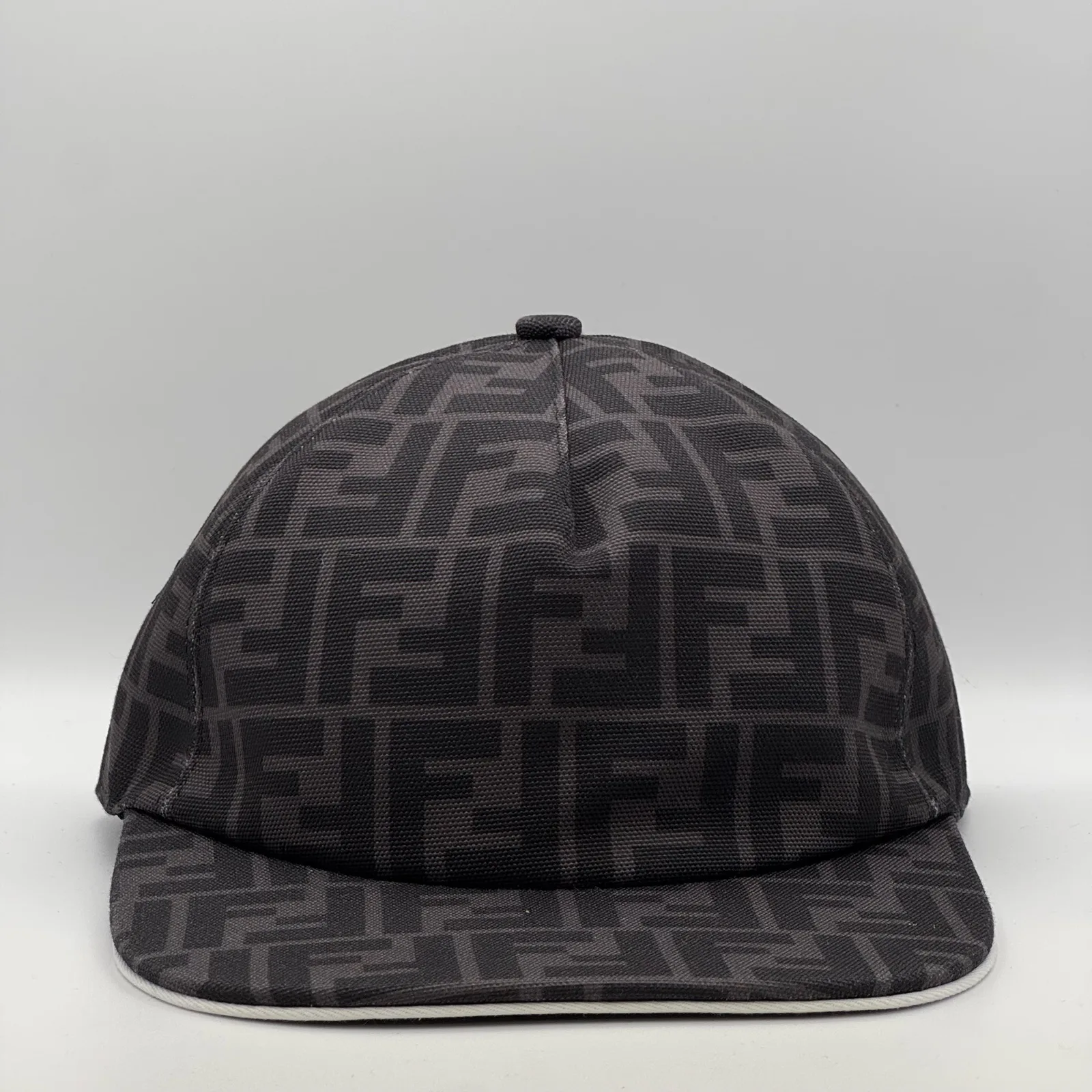 Dark grey Fendi FF cap, three-quarter front view.