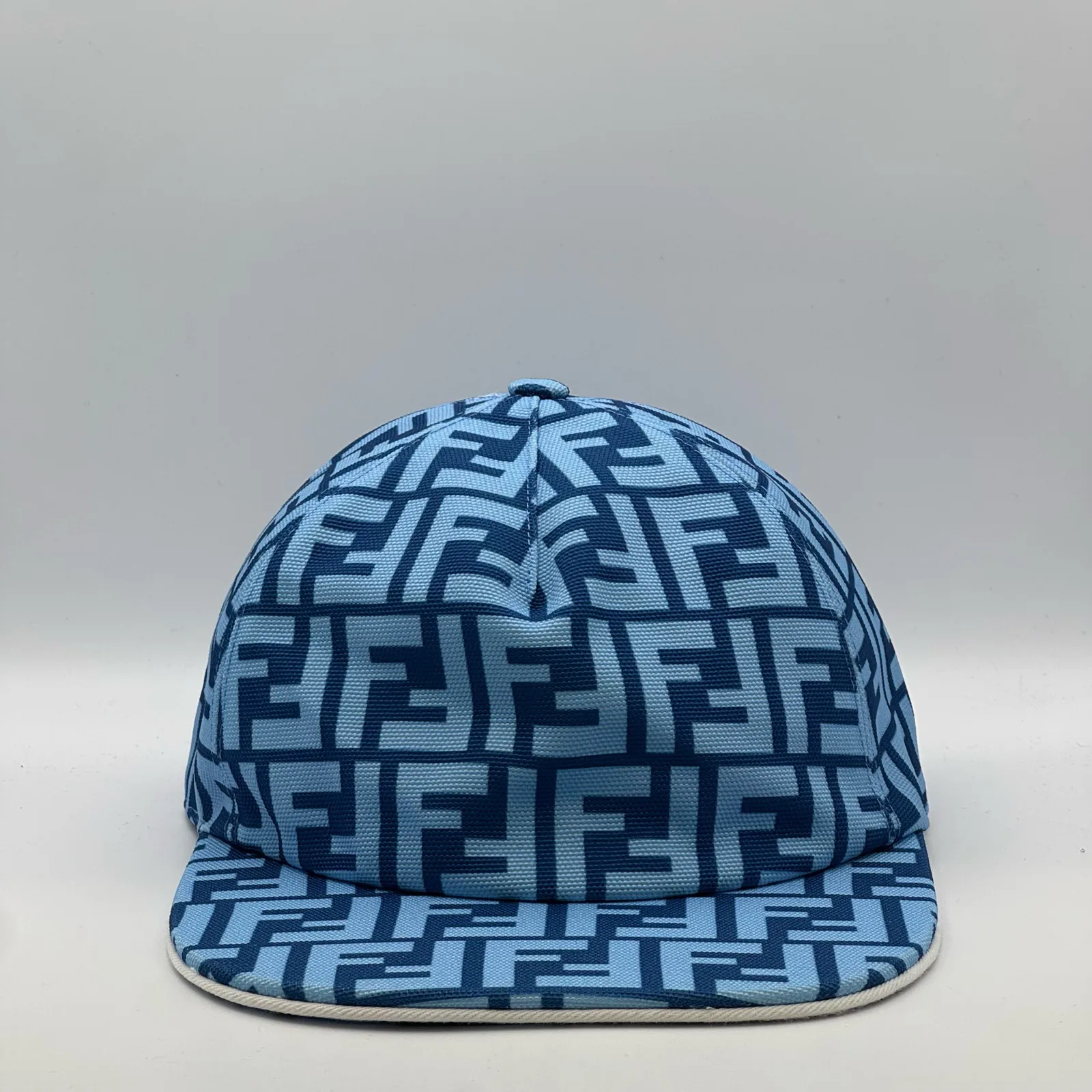 Light blue Fendi FF cap, three-quarter front-left view.