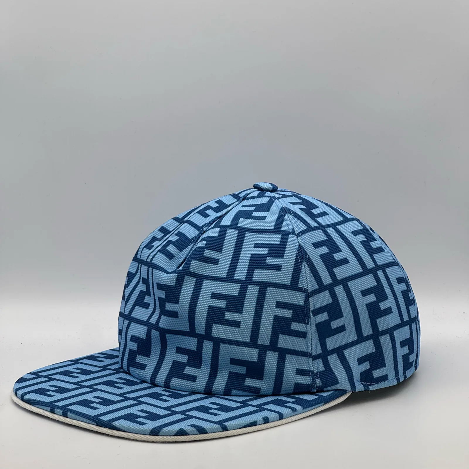 Light blue Fendi FF cap, three-quarter front-right view.