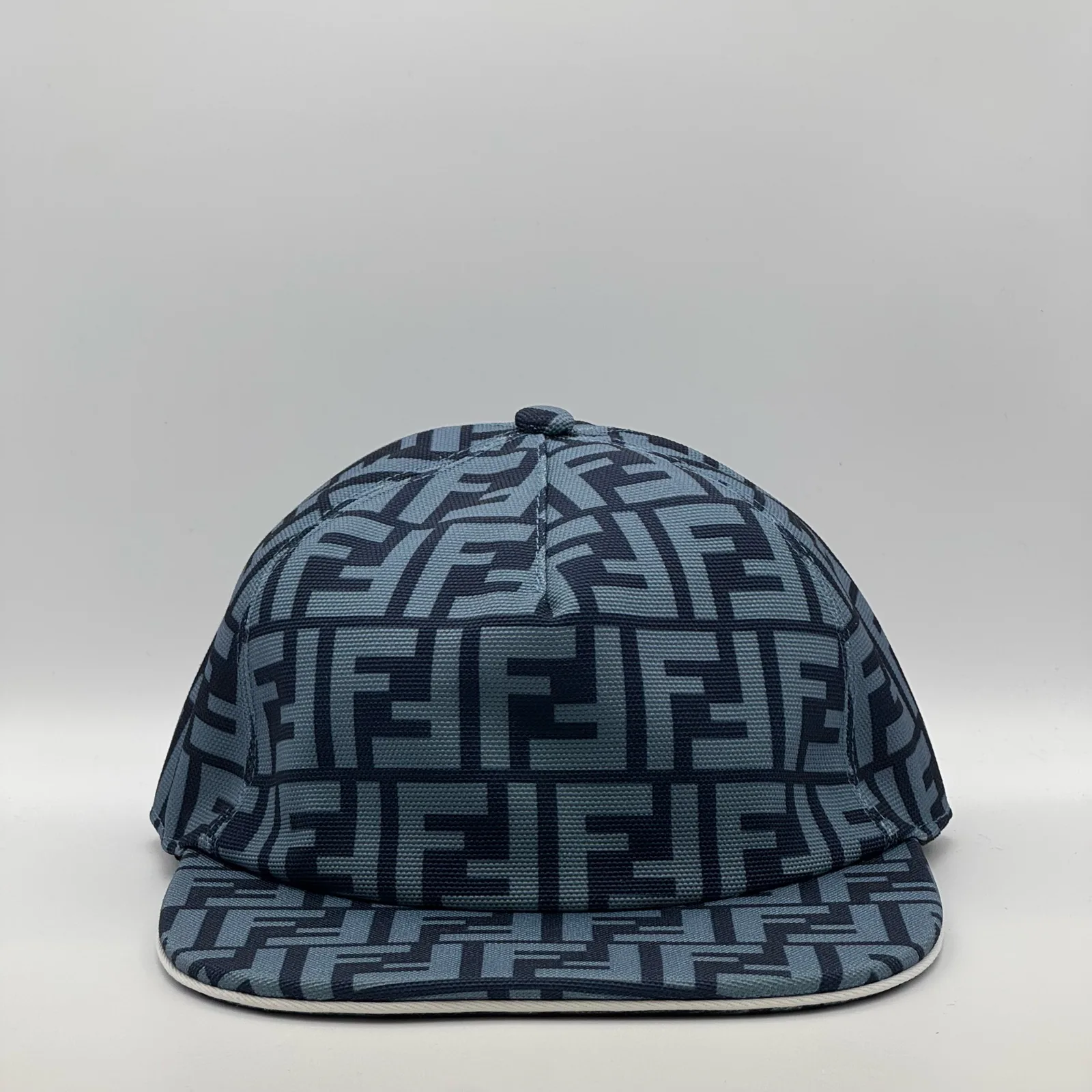 Navy blue Fendi FF cap, three-quarter front-left view.