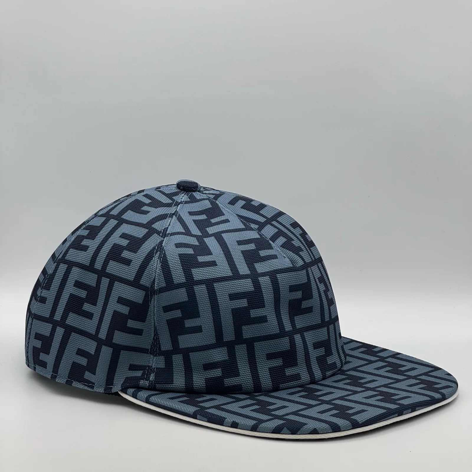 Navy blue Fendi FF cap, side profile.