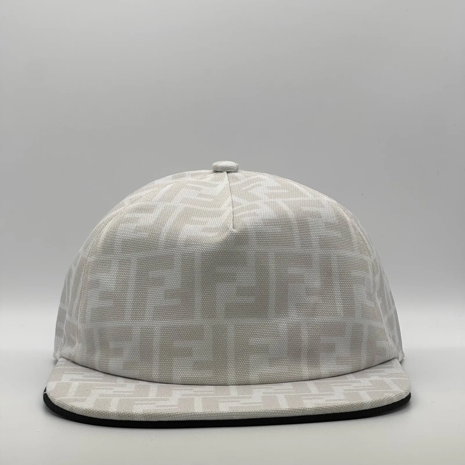 White Fendi FF cap, three-quarter front view.