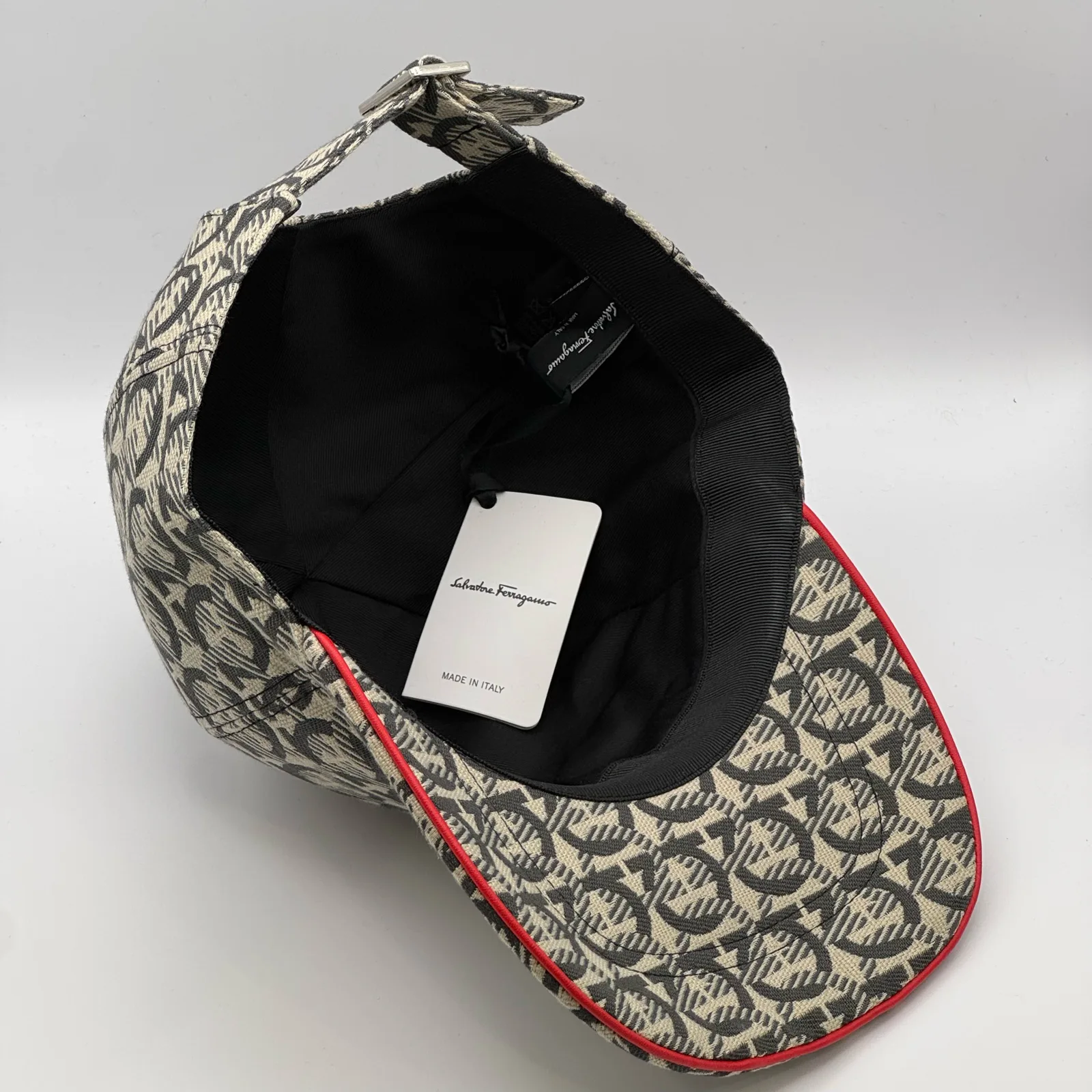 Ferragamo Gancini cap, underside view showing the interior brand label.