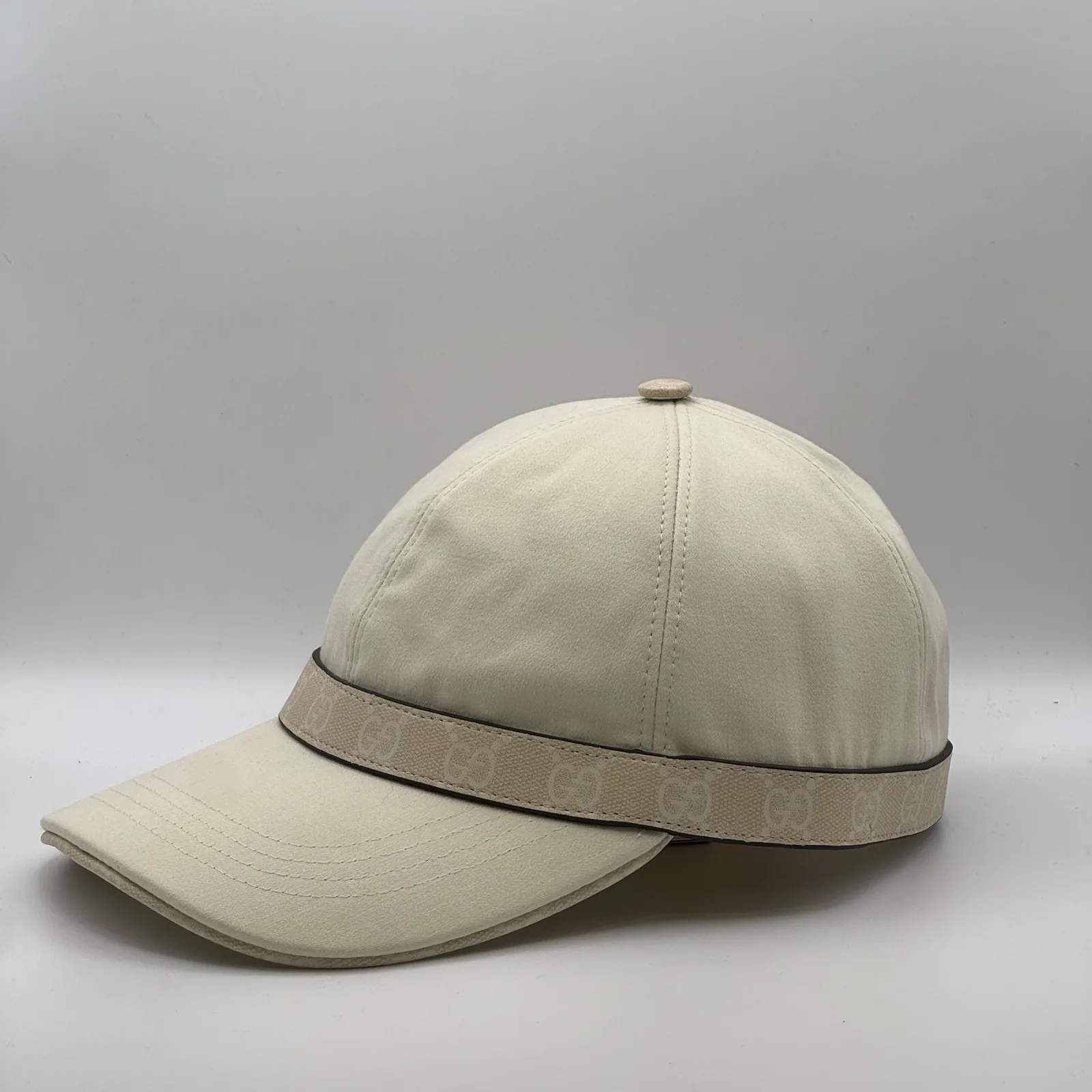 Cream GG band cap, side profile view