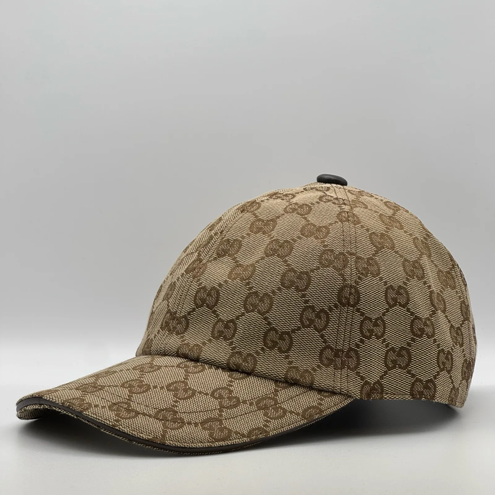 Beige GG canvas cap, straight-on front view showing the GG jacquard pattern