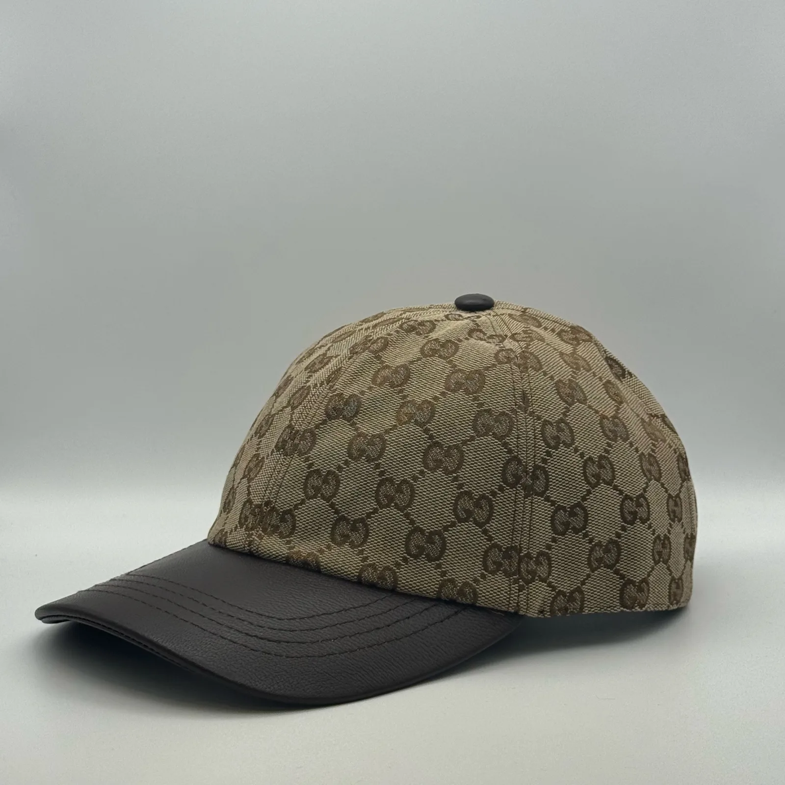 Beige GG canvas cap, straight-on front view showing the GG jacquard pattern