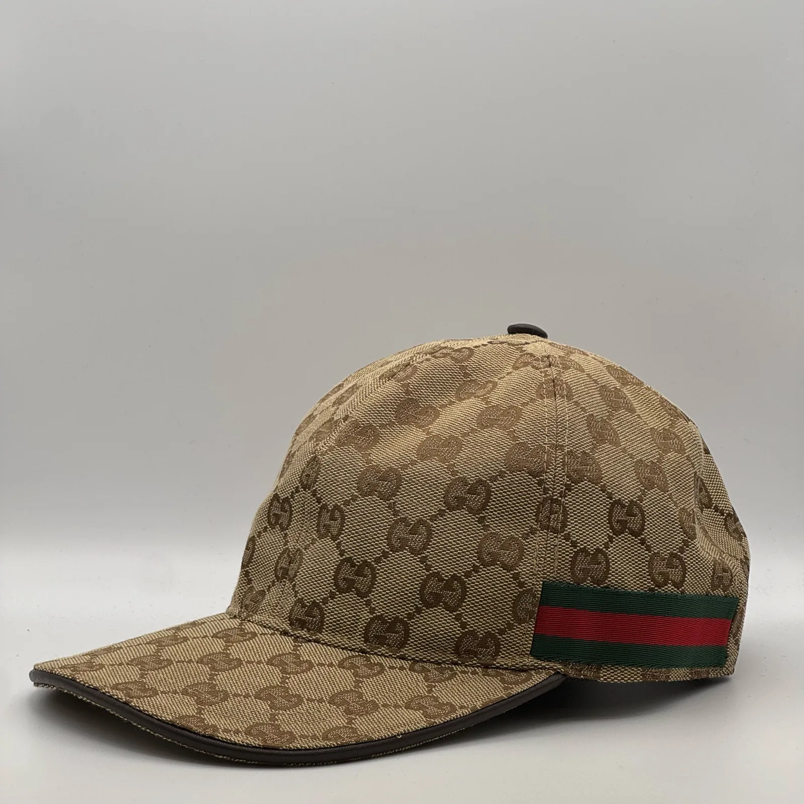 Beige GG canvas cap, straight-on front view showing the GG jacquard pattern