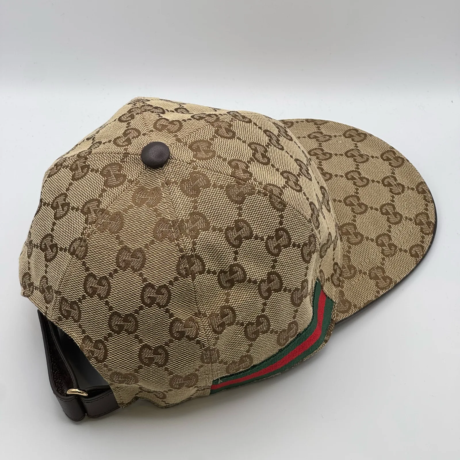 Beige GG canvas cap, three-quarter back view showing the crown and brim