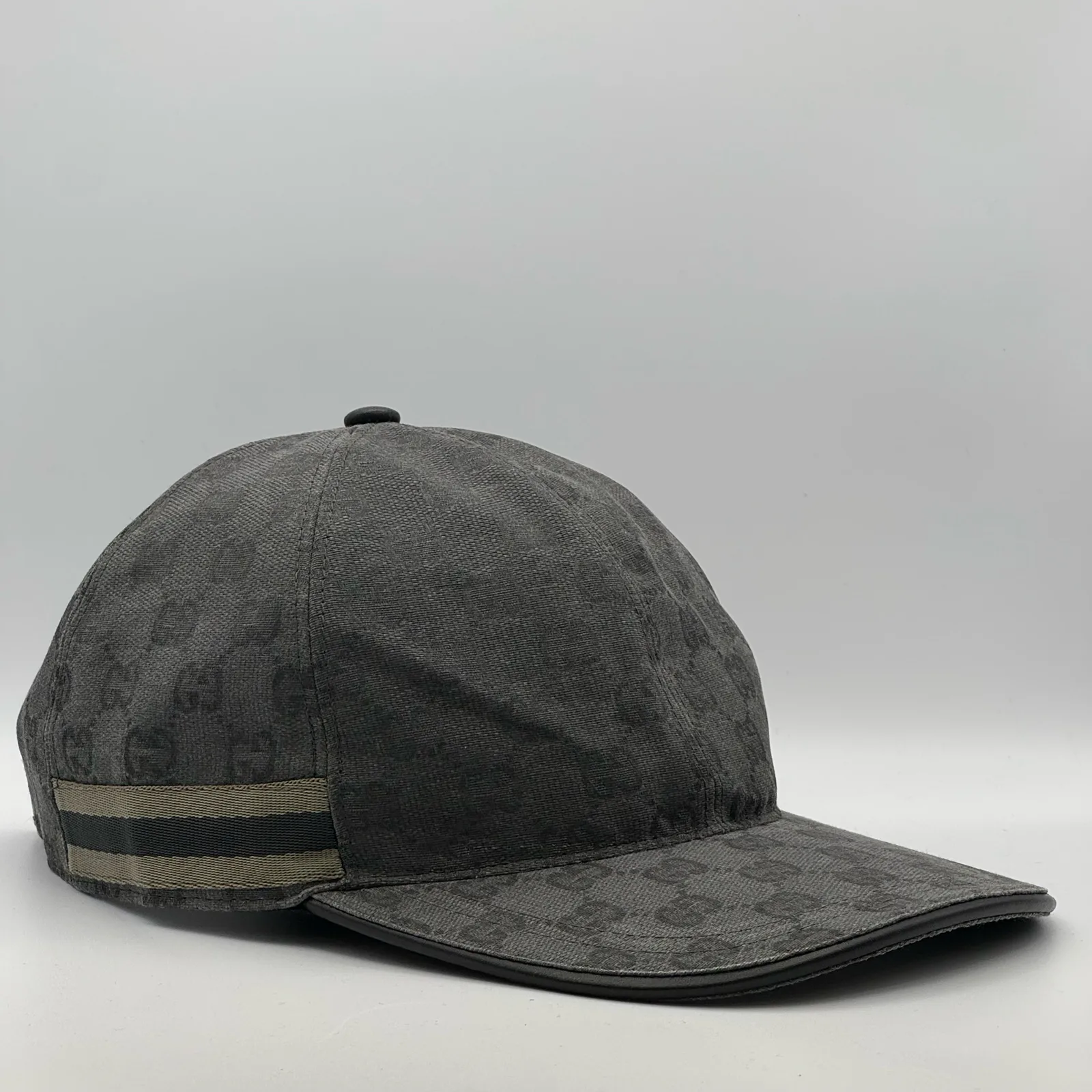 Charcoal grey GG canvas cap, front view showing the tonal jacquard pattern
