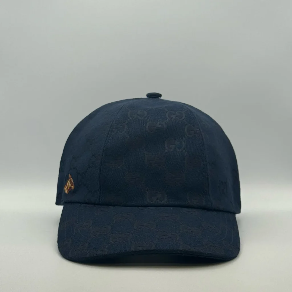 Navy GG canvas cap, front three-quarter view with a small embroidered horse patch