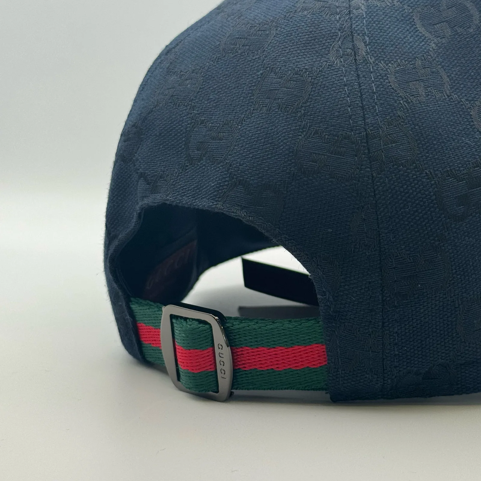 Navy GG canvas cap, underside view showing the cream interior lining