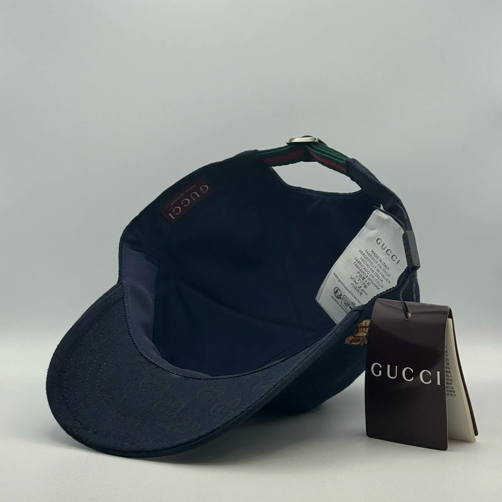 Navy GG canvas cap, interior view showing the lining and hanging tag