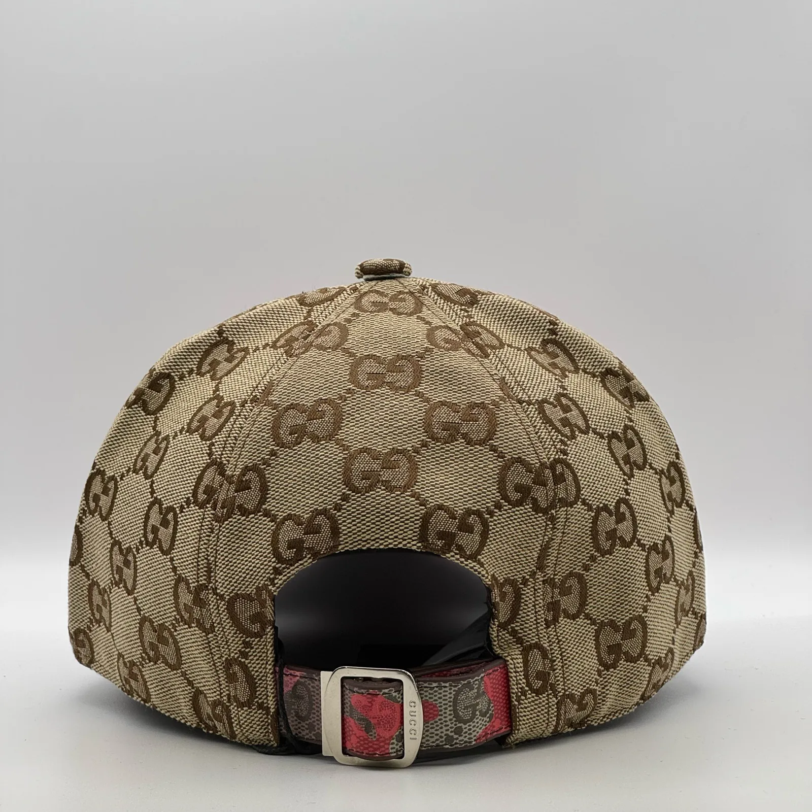 Beige GG canvas cap, back view with floral strap and silver-tone buckle