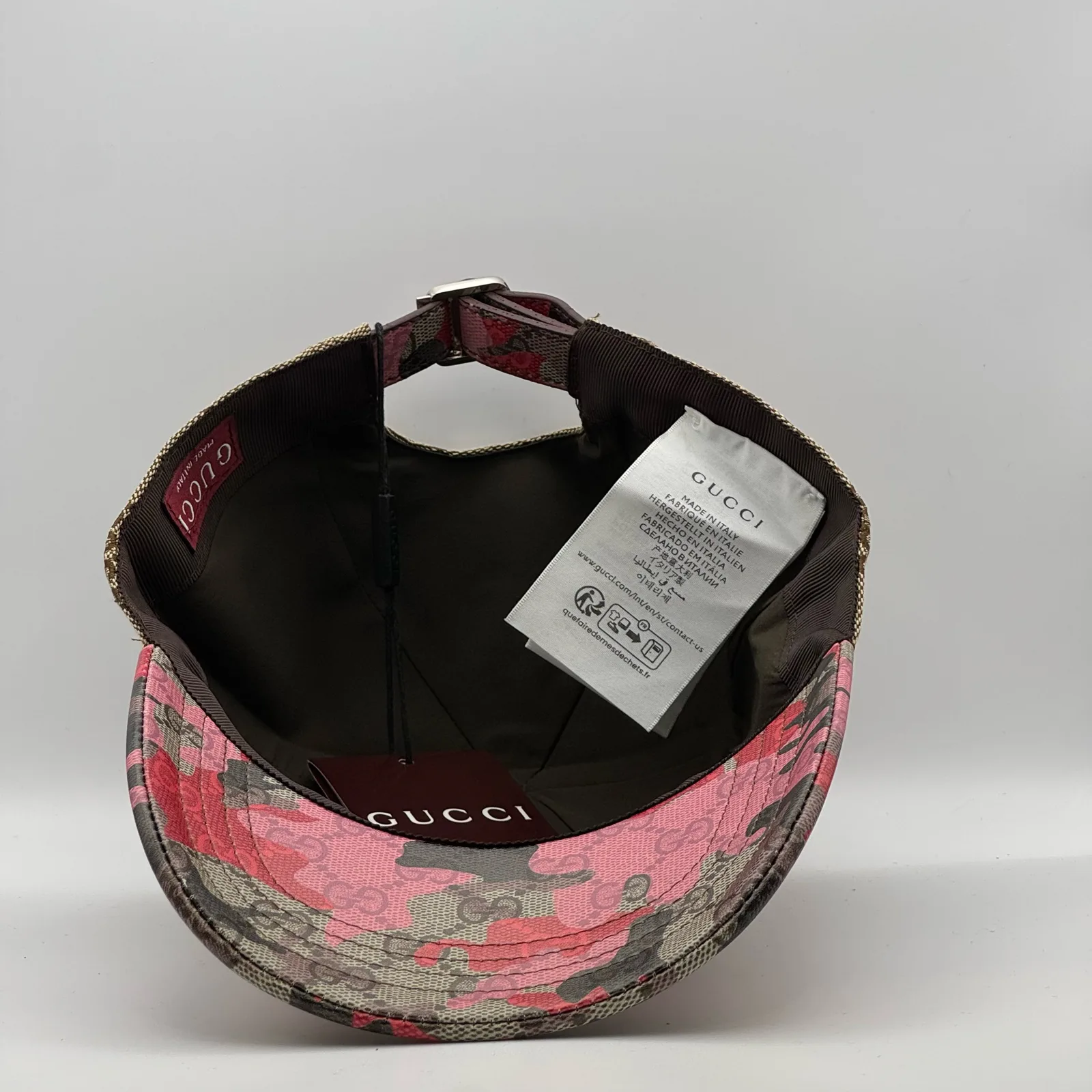 Beige GG canvas cap, interior view showing the brown lining and brand tag