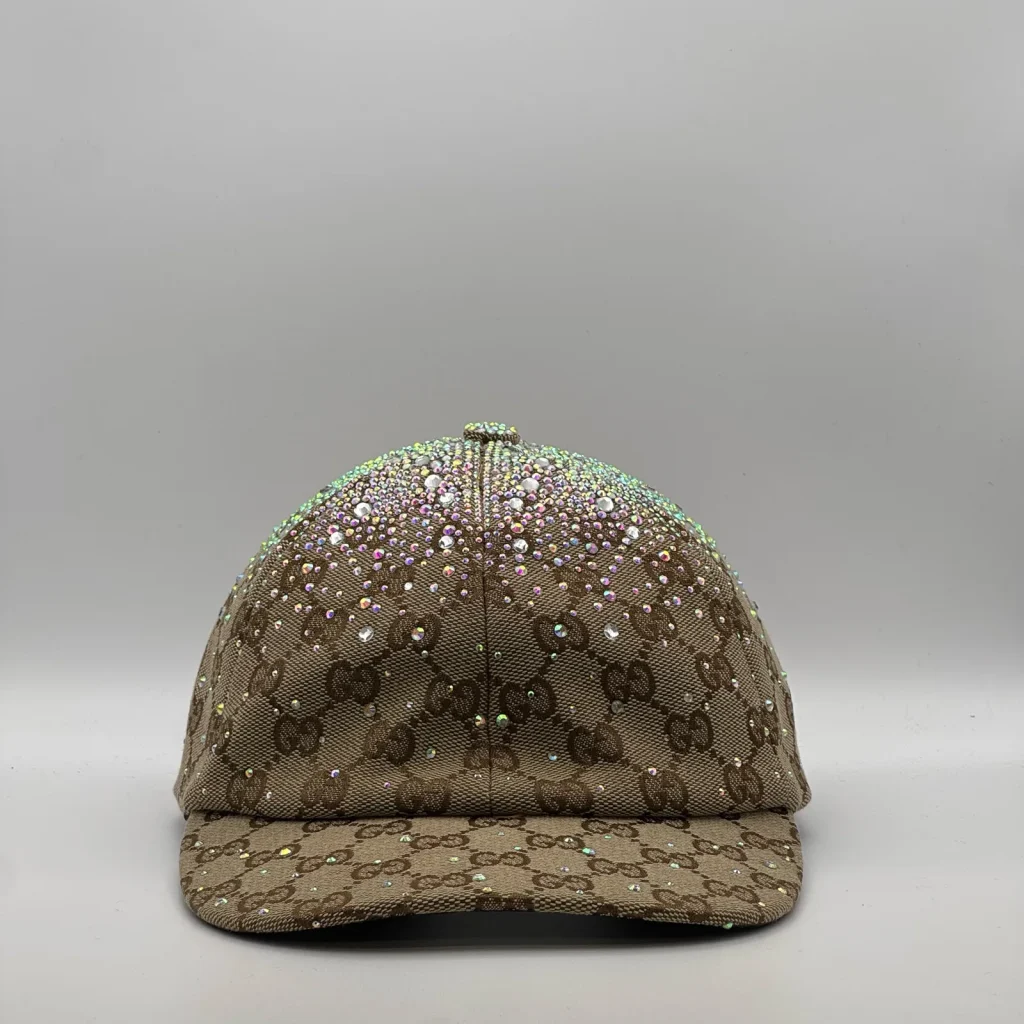 Beige cap with iridescent crystal gradient, front view