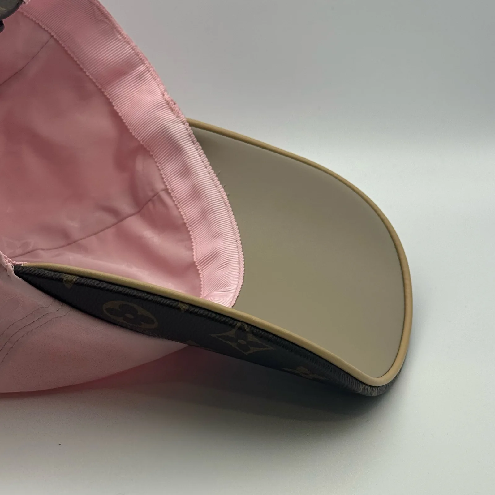 Close-up of the underbrim showing the monogram canvas lining.